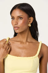 Sleeveless Bubble Hem Peplum Top